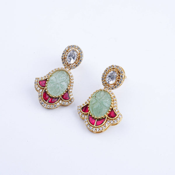 Angled view of a 22K gold-plated fashion earring highlighting its elegant silhouette, structure, and polished gold finish