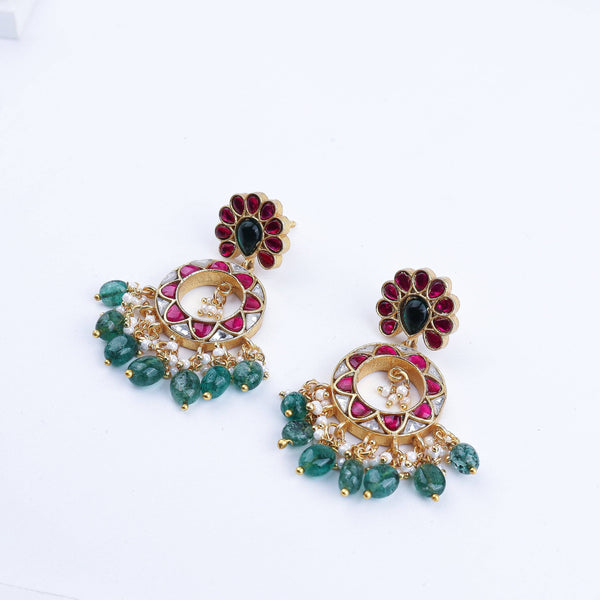 Angled view of a 22K gold-plated fashion earring highlighting its elegant silhouette, structure, and polished gold finish