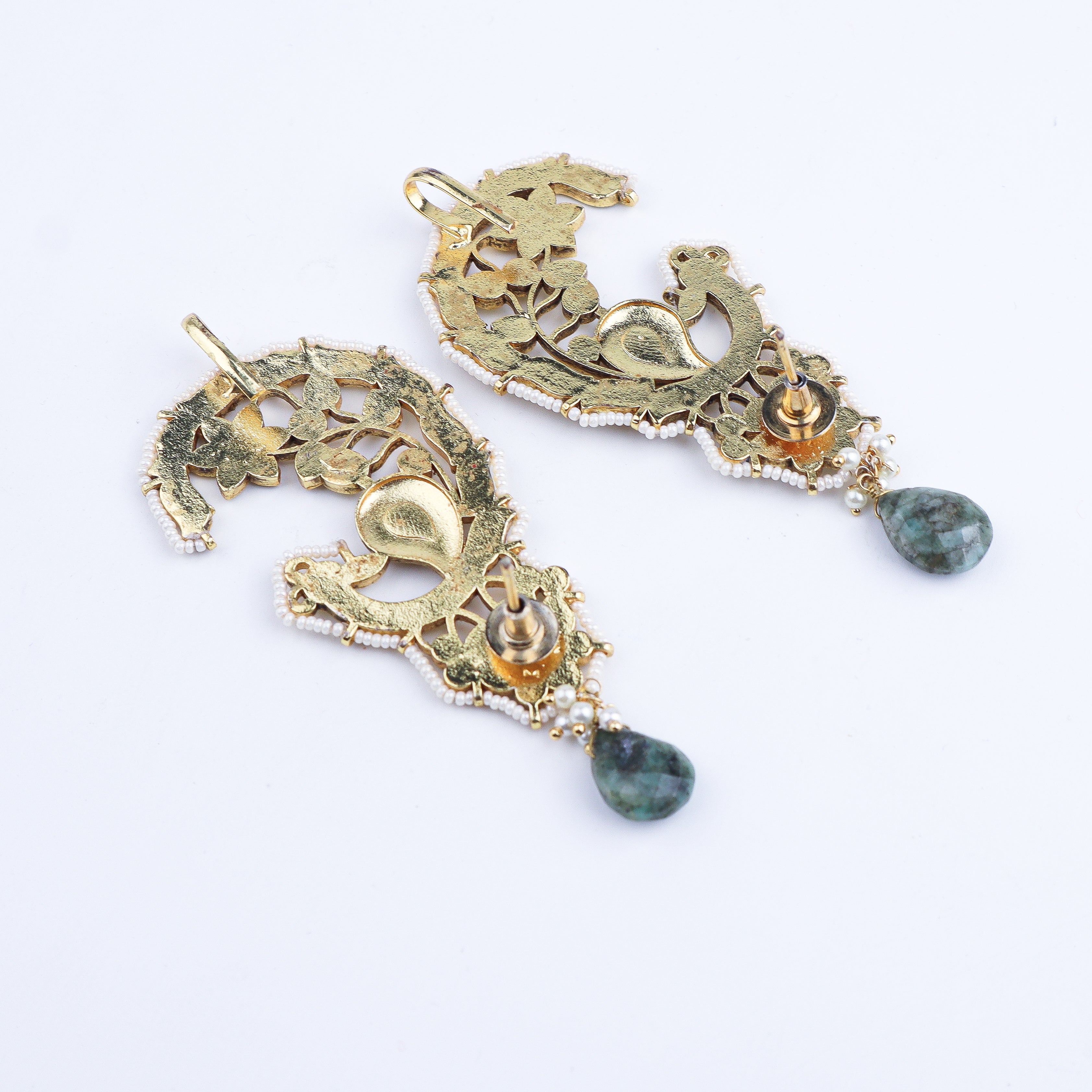 Angled view of a 22K gold-plated fashion earring highlighting its elegant structure, unique silhouette, and polished gold finish