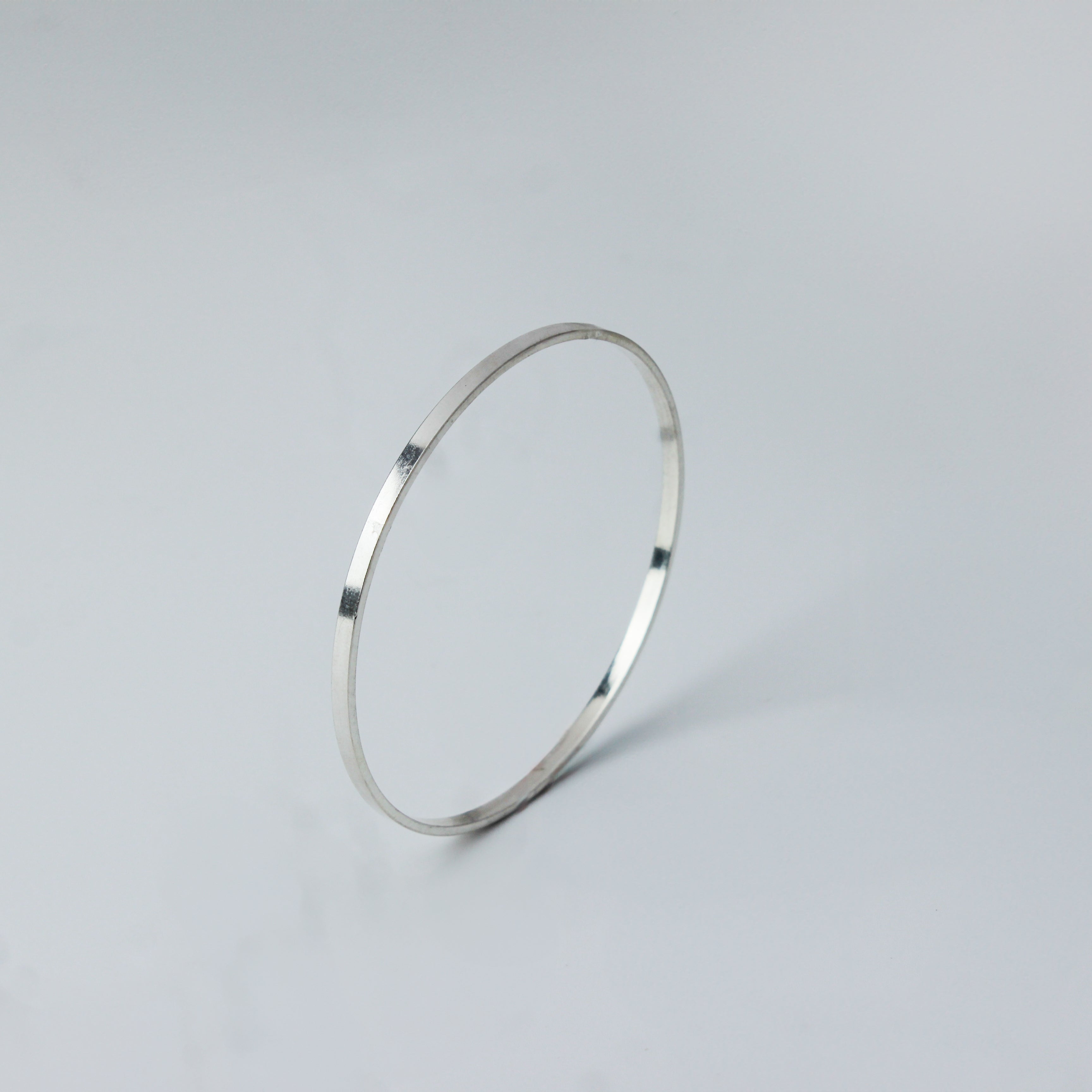 Silver flat bangle jewelry