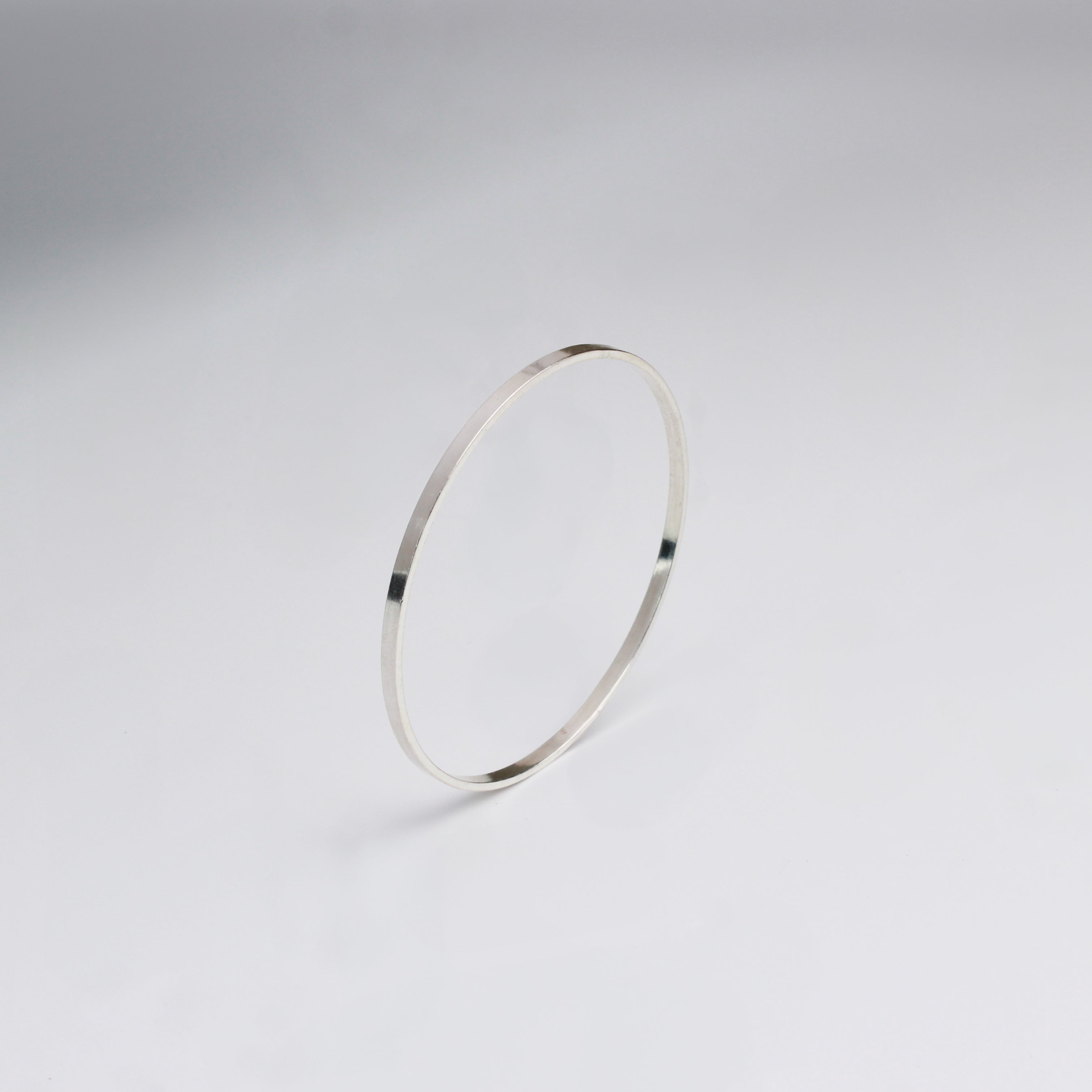 Silver flat bangle jewelry