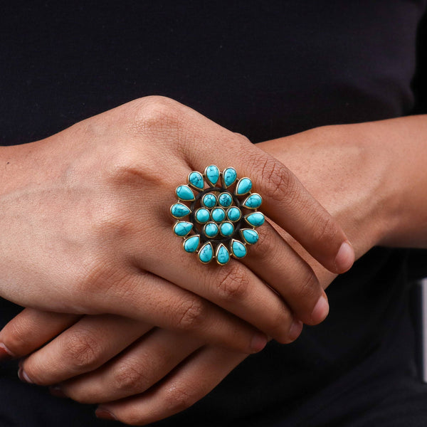 Model wearing a brass fashion ring for a stylish and contemporary fashion jewelry look