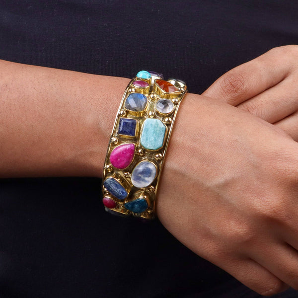 Model wearing a brass fashion bracelet for a stylish and contemporary fashion jewelry look