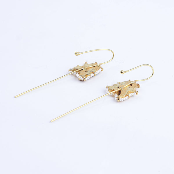 Angled view of a 22K gold-plated fashion earring highlighting its elegant structure, unique silhouette, and polished gold finish