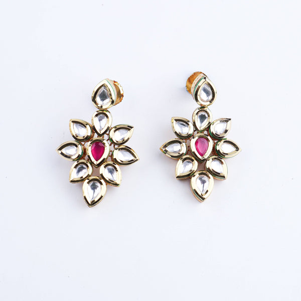 Angled view of a 22K gold-plated fashion set highlighting its coordinated design, elegant structure, and polished gold finish