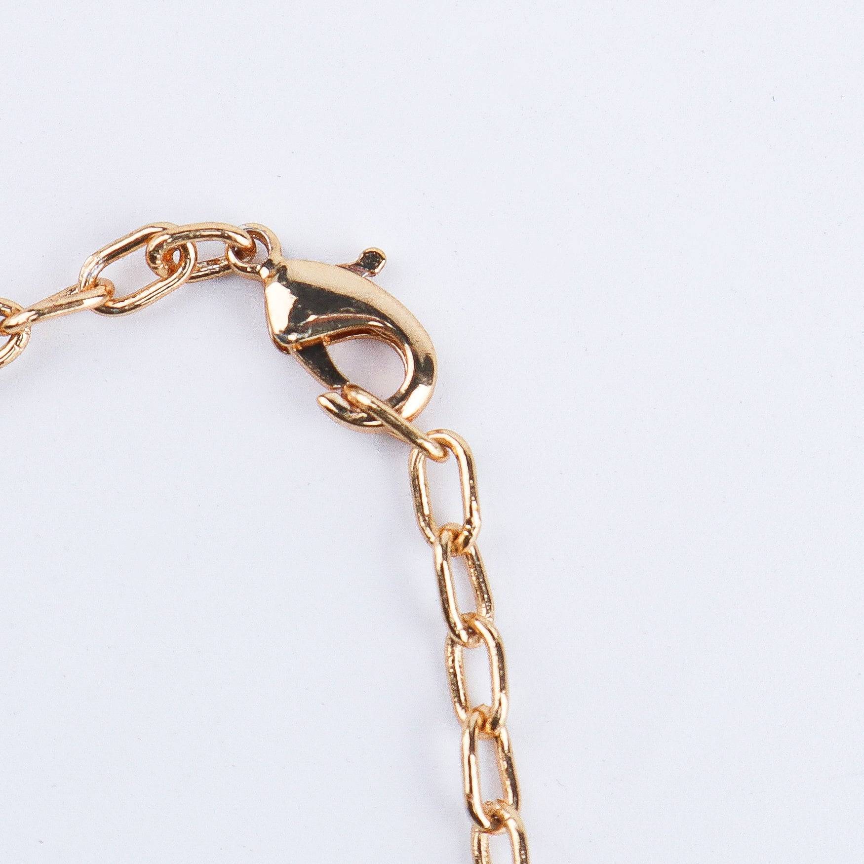 Angled view of 22K gold-plated fashion Set highlighting the coordinated design, elegant structure, and polished gold finish