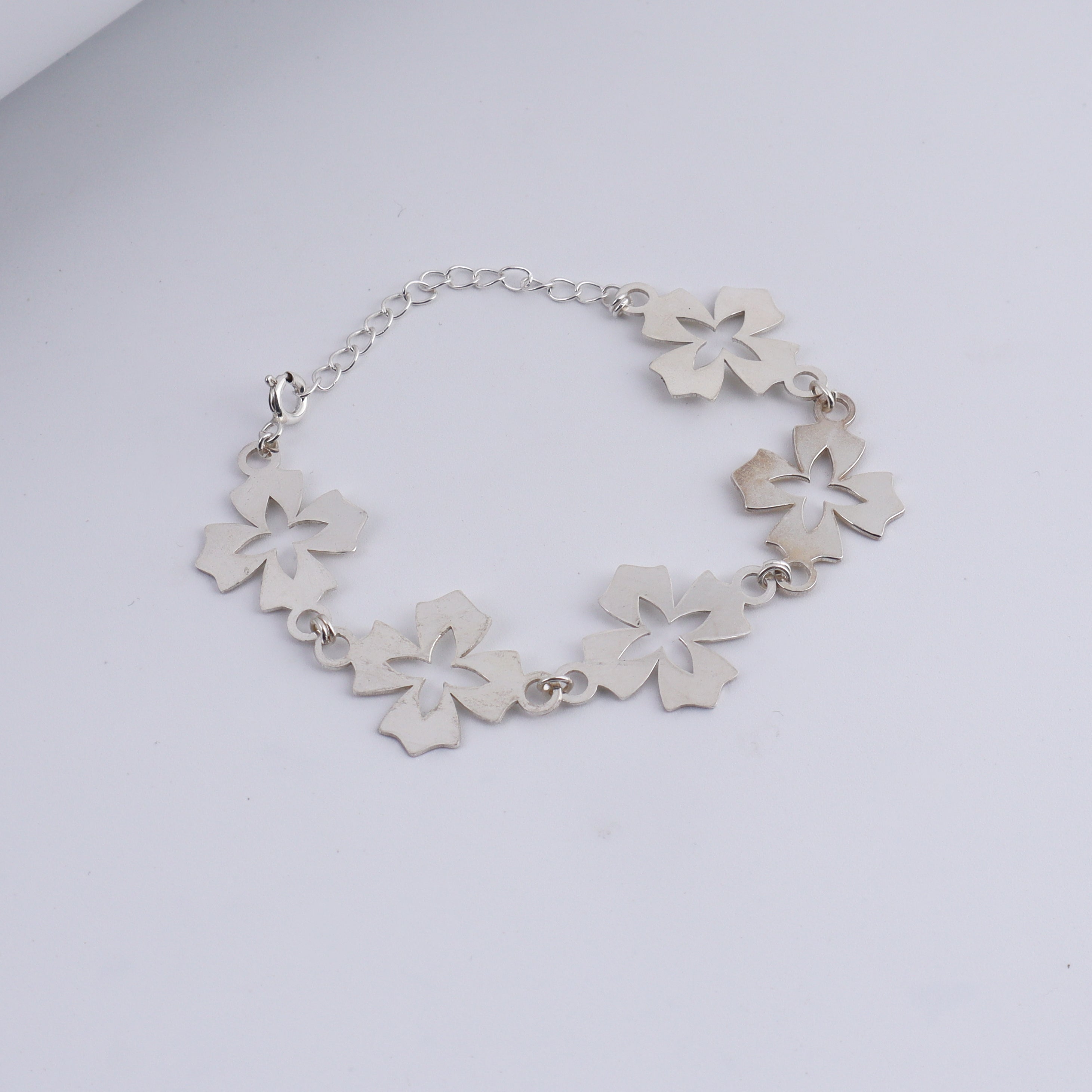 Silver Floral Multi Motif Bracelet
