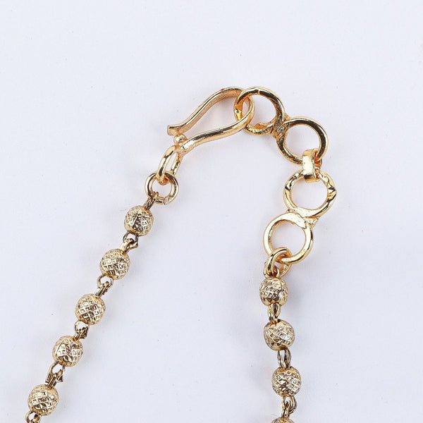 Angled view of the 22K gold-plated fashion set highlighting its coordinated design, elegant structure, and polished gold finish