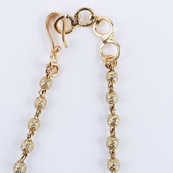 Angled view of the 22K gold-plated fashion set highlighting its coordinated design, elegant structure, and polished gold finish