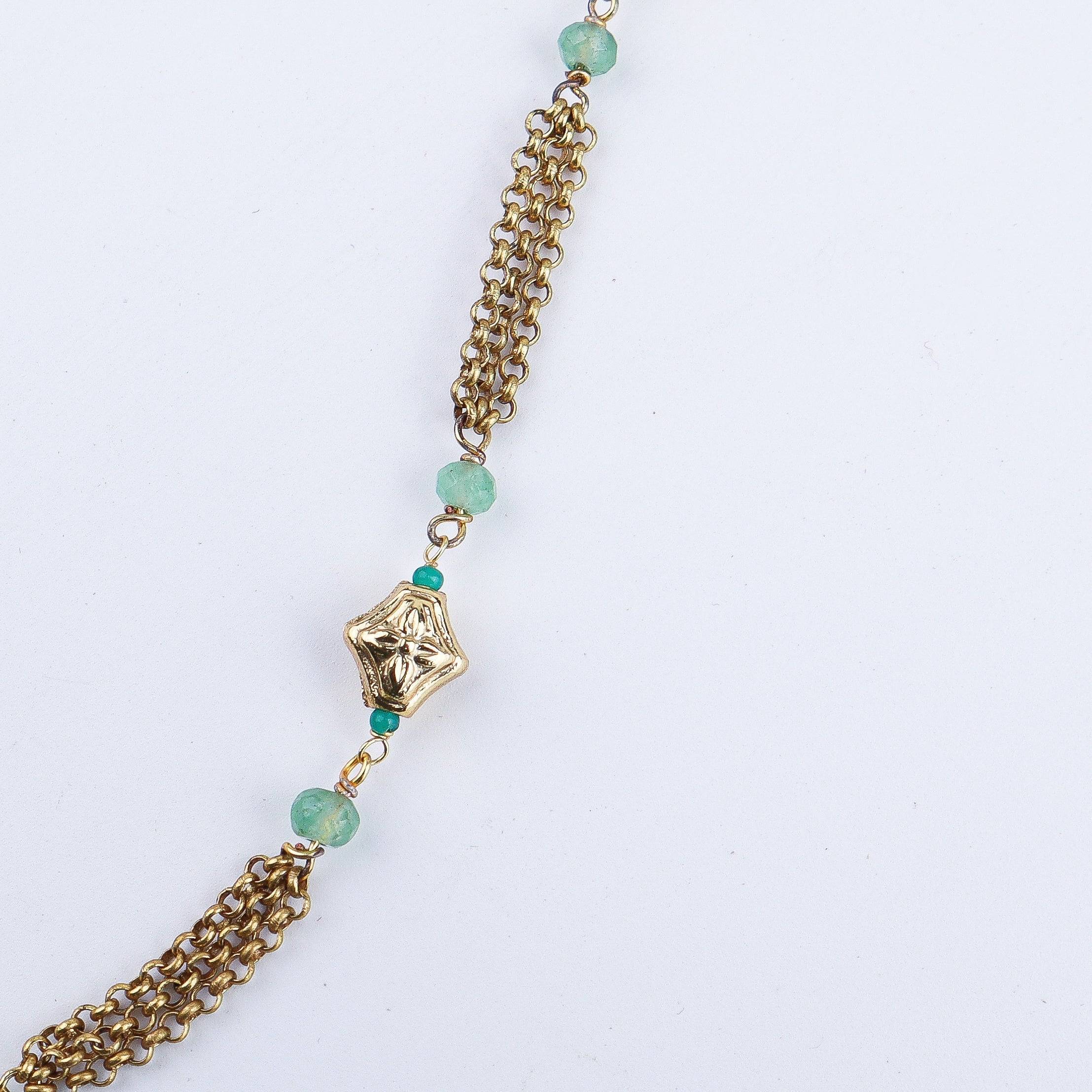 Angled view of the 22K gold-plated fashion set highlighting its coordinated design, elegant structure, and polished gold finish