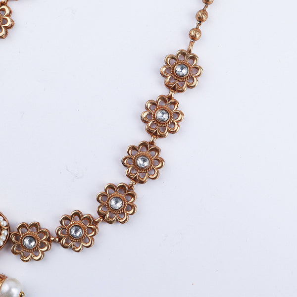 Angled view of the 22K gold-plated fashion set highlighting its coordinated design, elegant structure, and polished gold finish