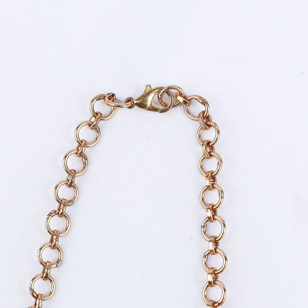 Flat-lay of 22K Gold-Plated Fashion Set with complementary gold-plated jewelry and elegant festive accessories