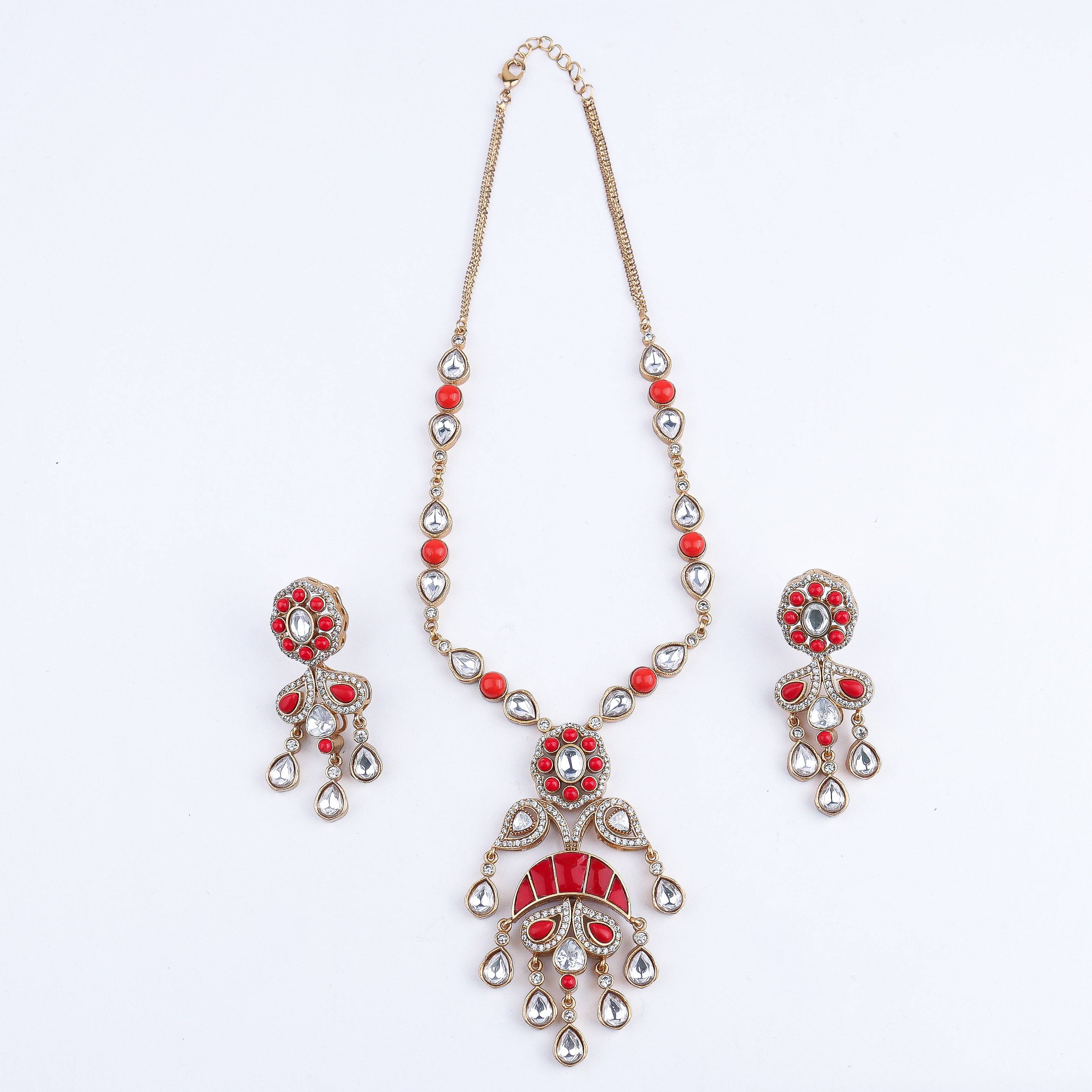 Detailed view of a 22K gold-plated fashion set highlighting intricate motifs, textured detailing, and a premium 22K gold-plated finish