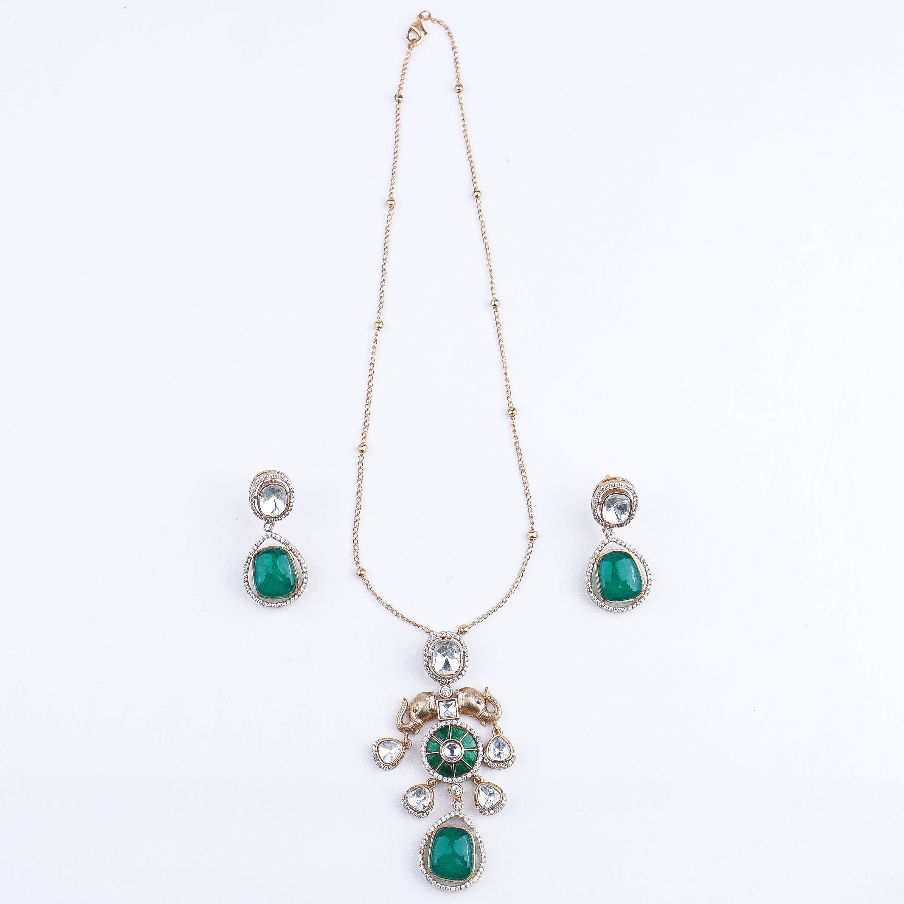 Detailed view of a 22K gold-plated fashion set highlighting intricate motifs, textured detailing, and a premium 22K gold-plated finish