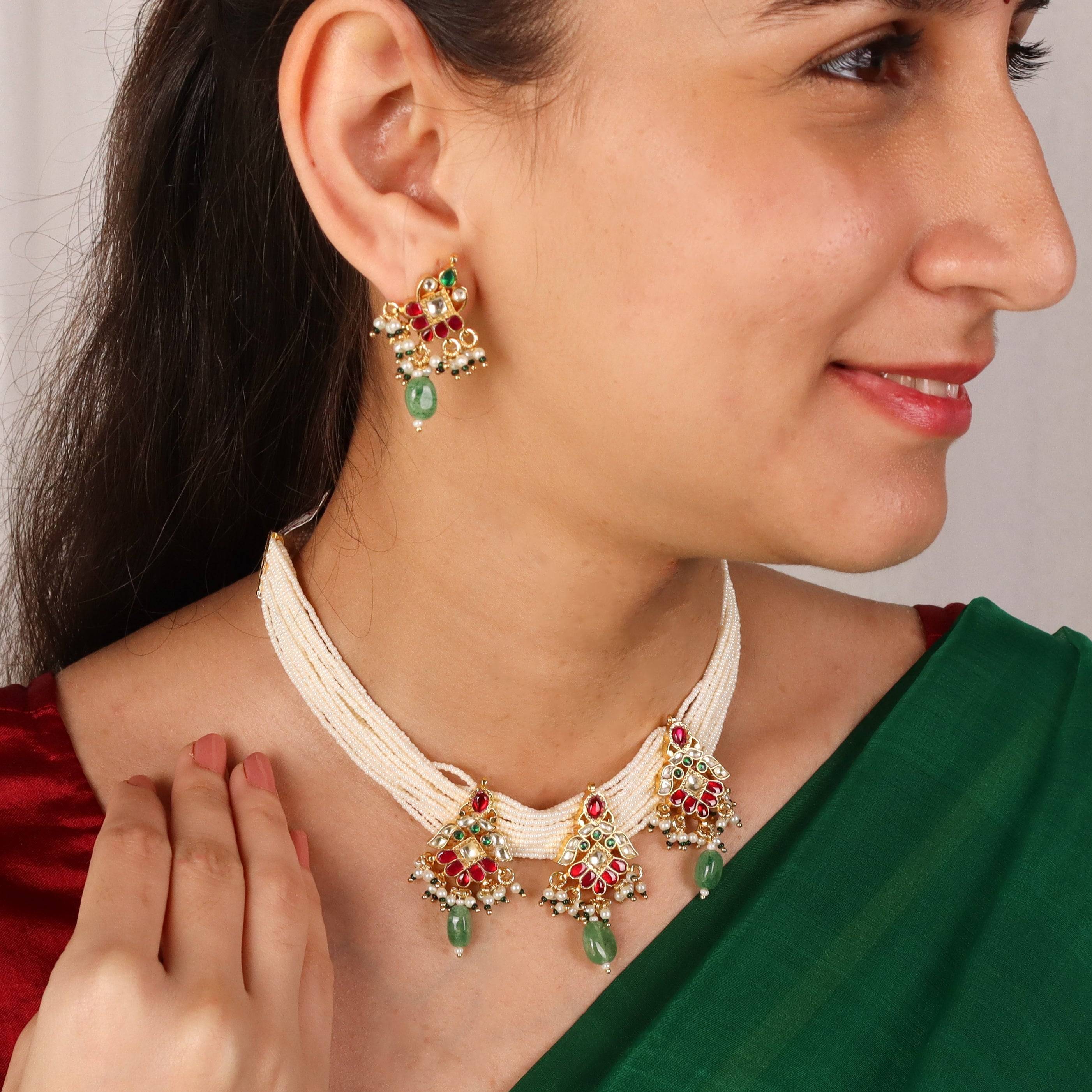 Model wearing a 22K gold-plated fashion necklace for a sophisticated and elegant jewelry look