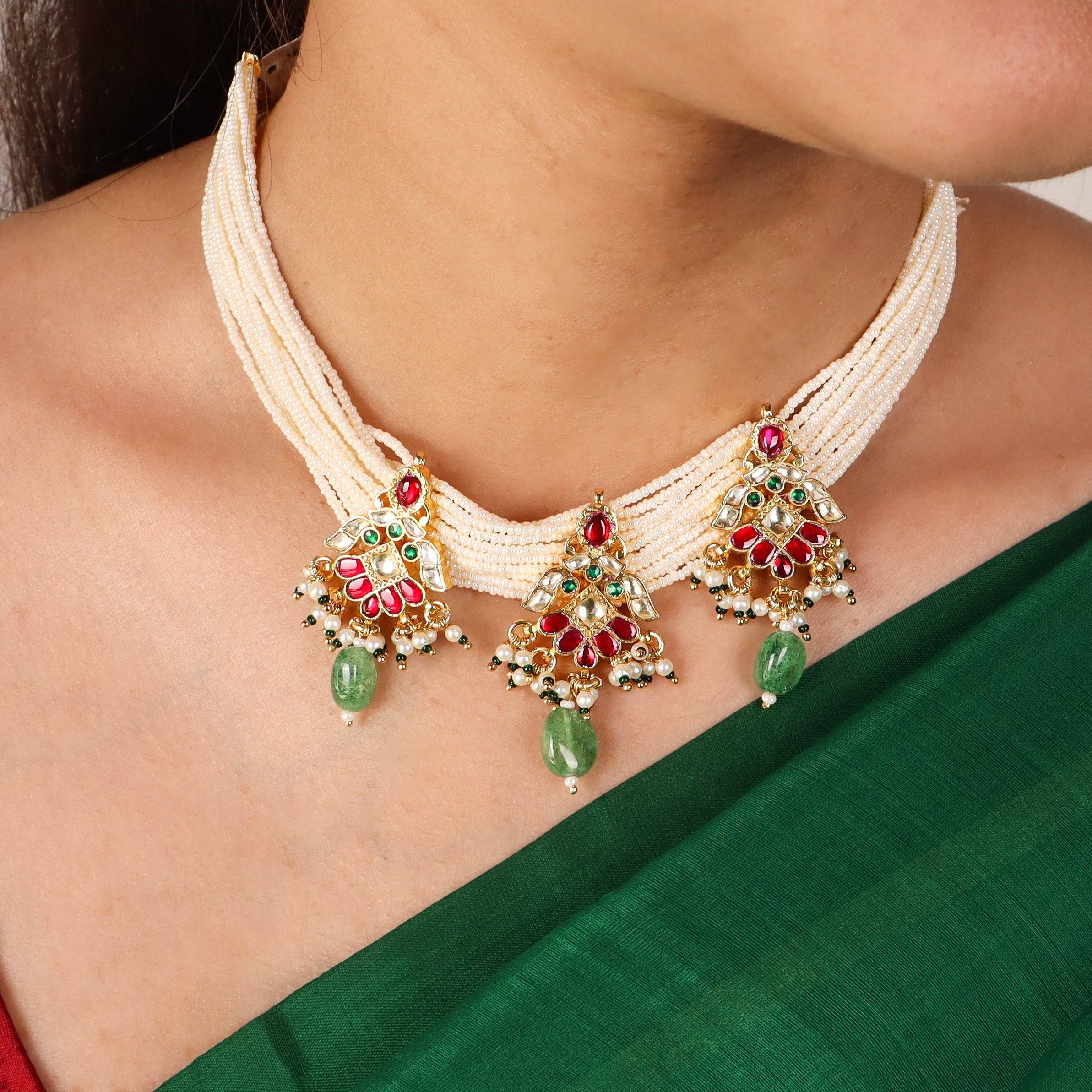 Model wearing a 22K gold-plated fashion necklace for a sophisticated and elegant jewelry look