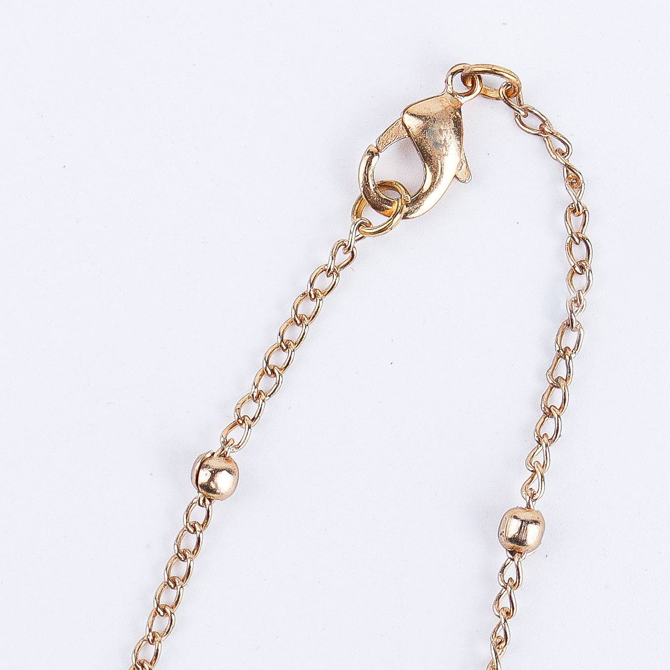 Angled view of 22K gold-plated fashion Set highlighting the coordinated design, elegant structure, and polished gold finish