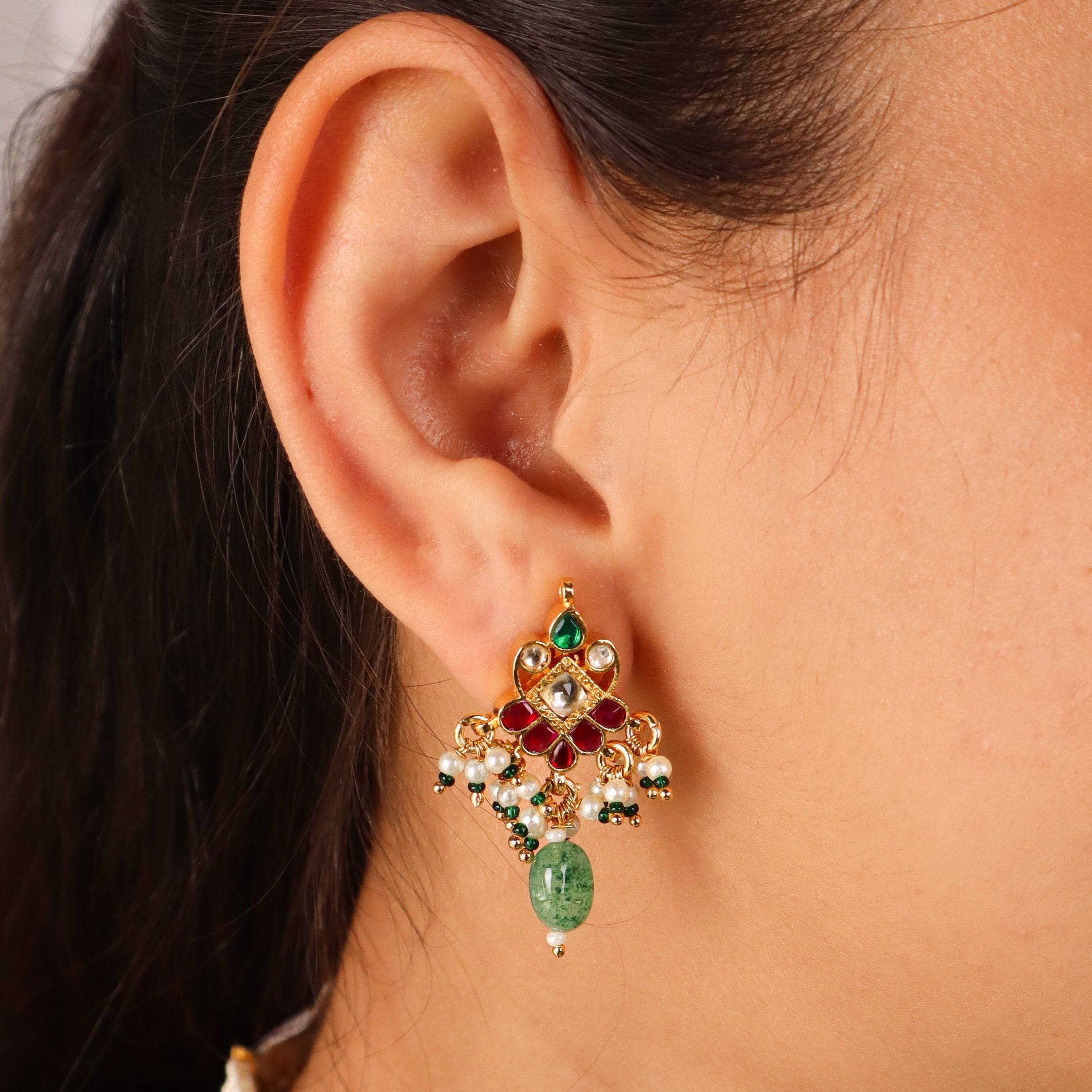 Model wearing a 22K gold-plated fashion necklace for a sophisticated and elegant jewelry look