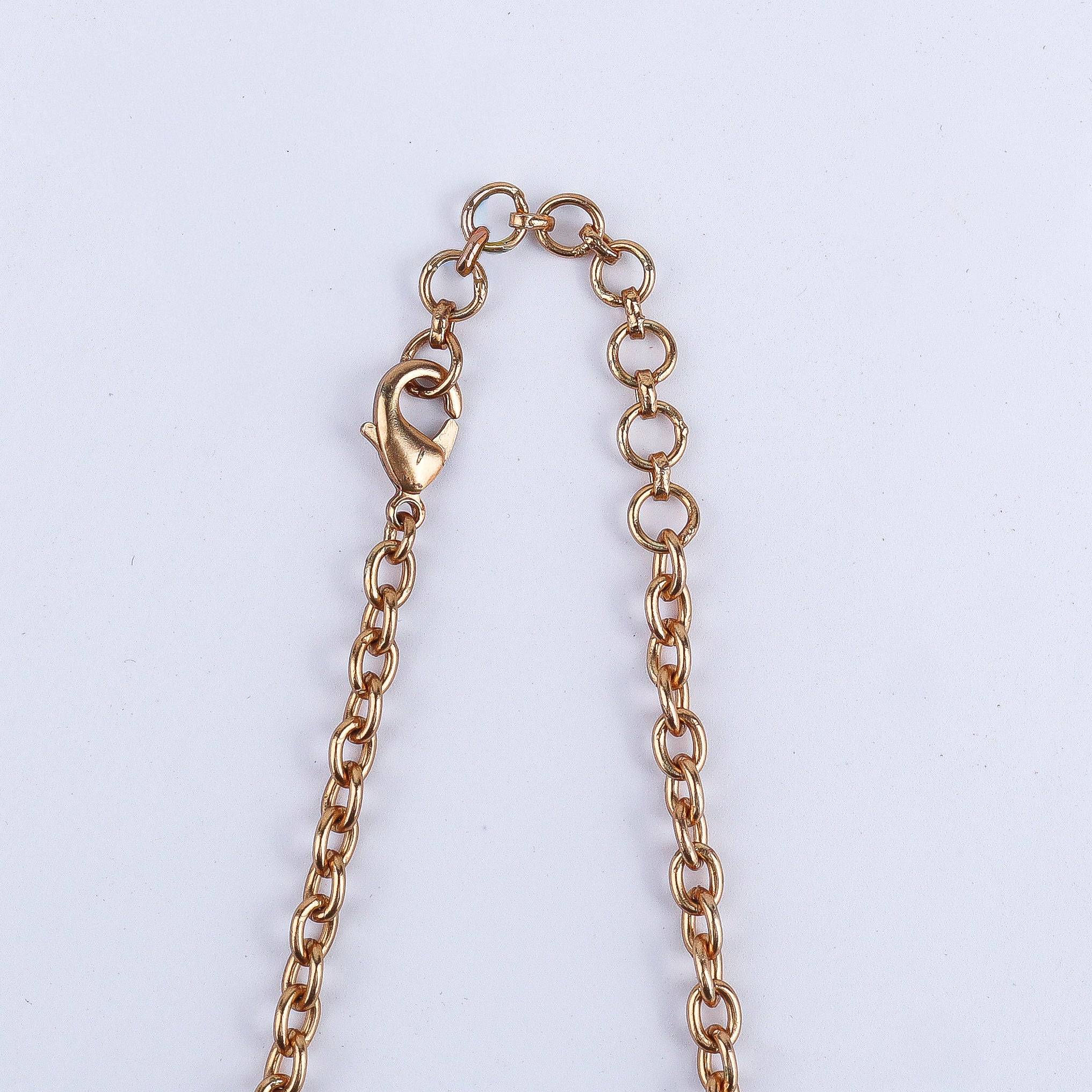 Angled view of the 22K gold-plated fashion set highlighting its coordinated design, elegant structure, and polished gold finish