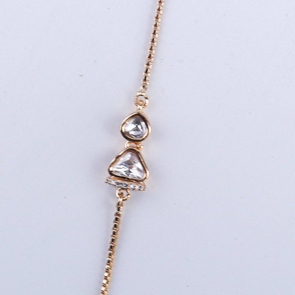 Angled view of the 22K gold-plated fashion set highlighting its coordinated design, elegant structure, and polished gold finish