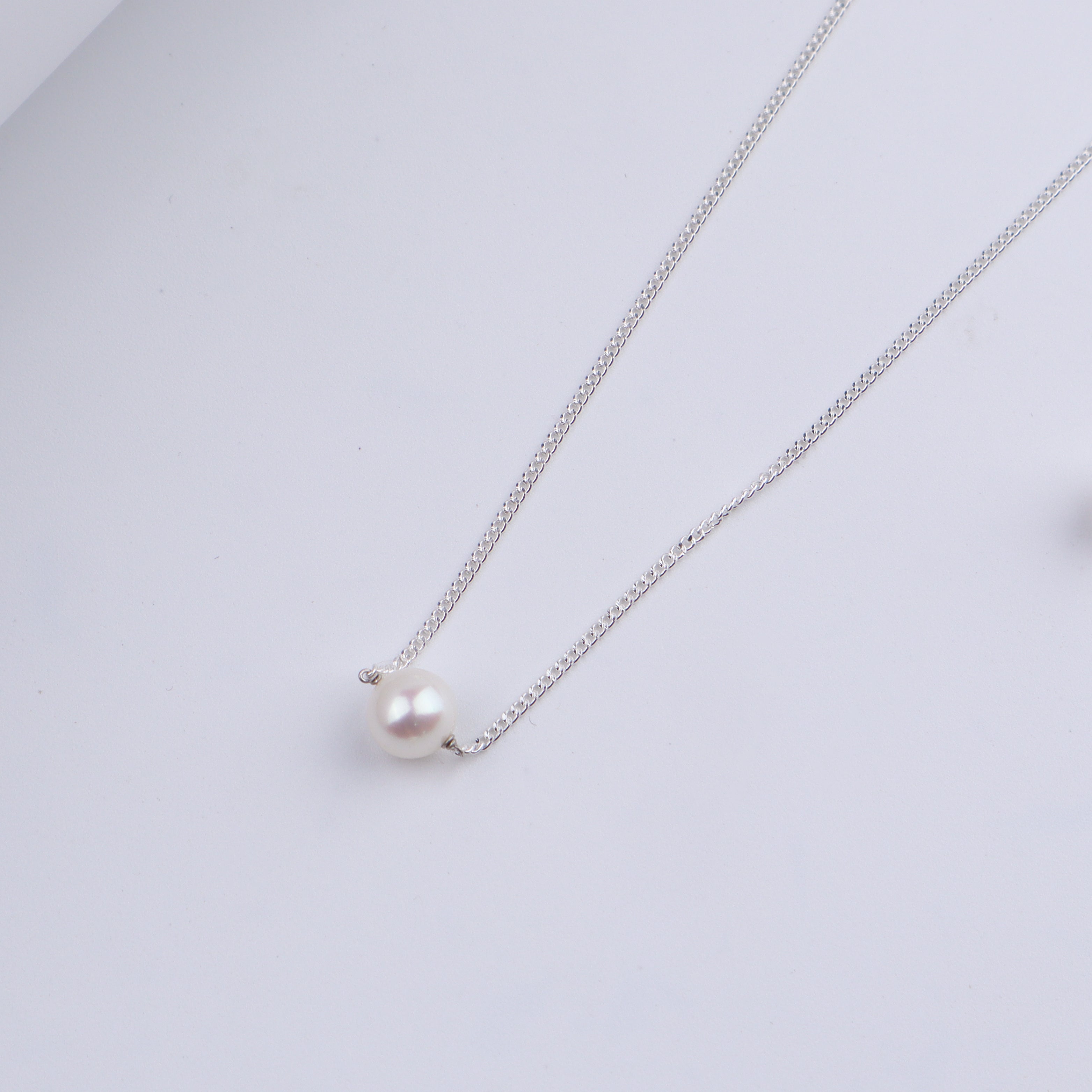 Silver pearl necklace