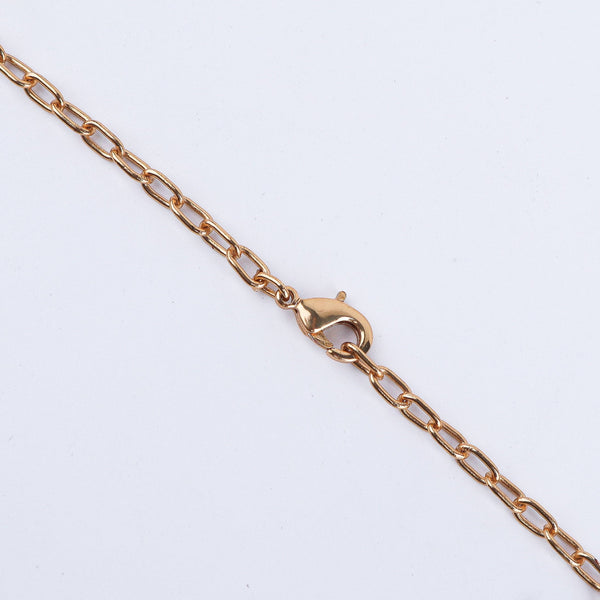 Angled view of the 22K gold-plated fashion set highlighting its coordinated design, elegant structure, and polished gold finish