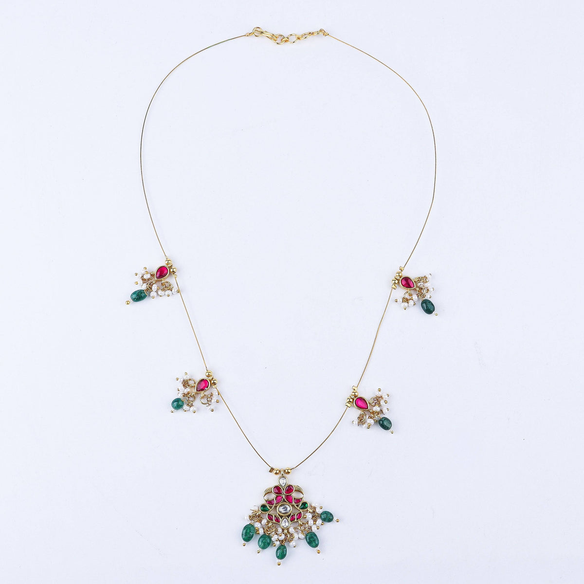 Detailed view of 22K gold-plated fashion necklace highlighting intricate motifs, textured detailing, and a premium 22K gold-plated finish