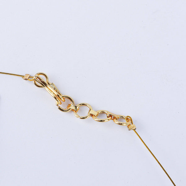 Angled view of 22K gold-plated fashion necklace highlighting its elegant structure, design, and polished gold finish