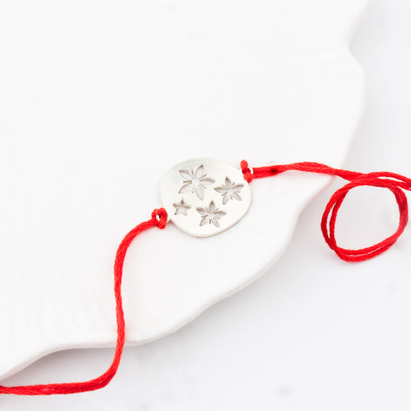 Silver Laser Cut Floral Rakhi