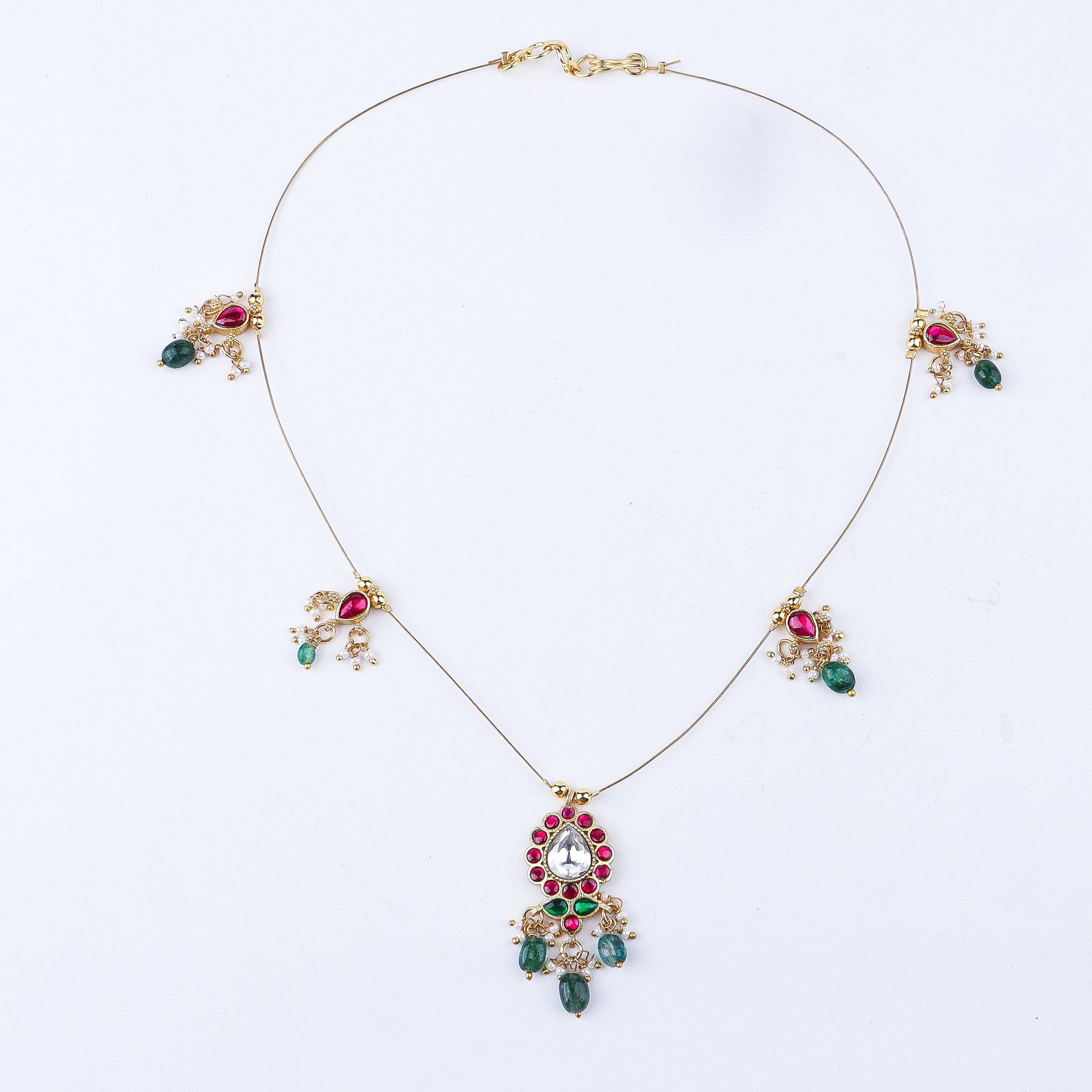 Detailed view of a 22K gold-plated fashion necklace highlighting intricate motifs, textured detailing, and a premium 22K gold-plated finish