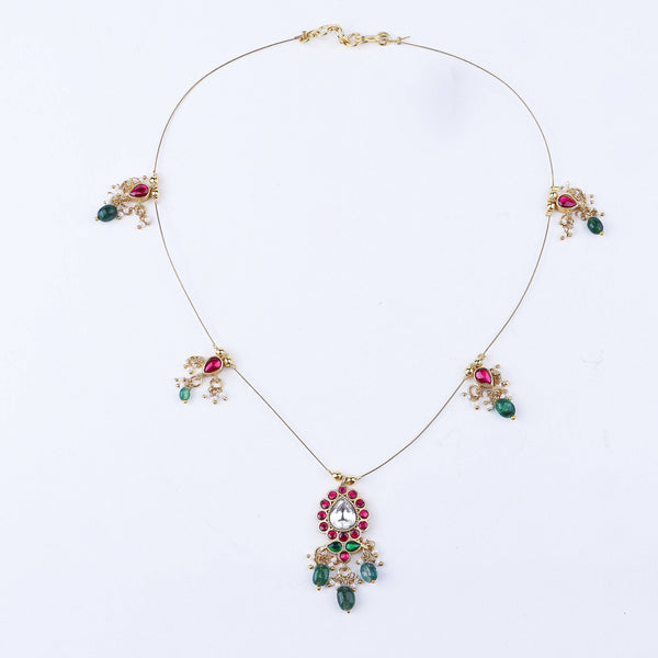 Detailed view of a 22K gold-plated fashion necklace highlighting intricate motifs, textured detailing, and a premium 22K gold-plated finish