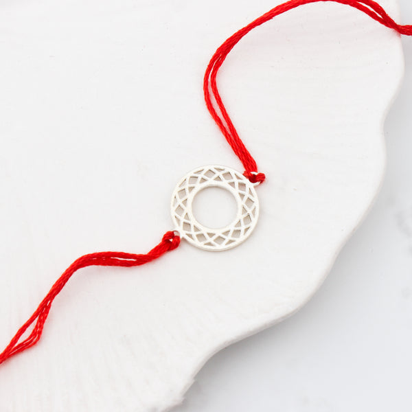 Silver Laser Cut Filigree Round Rakhi