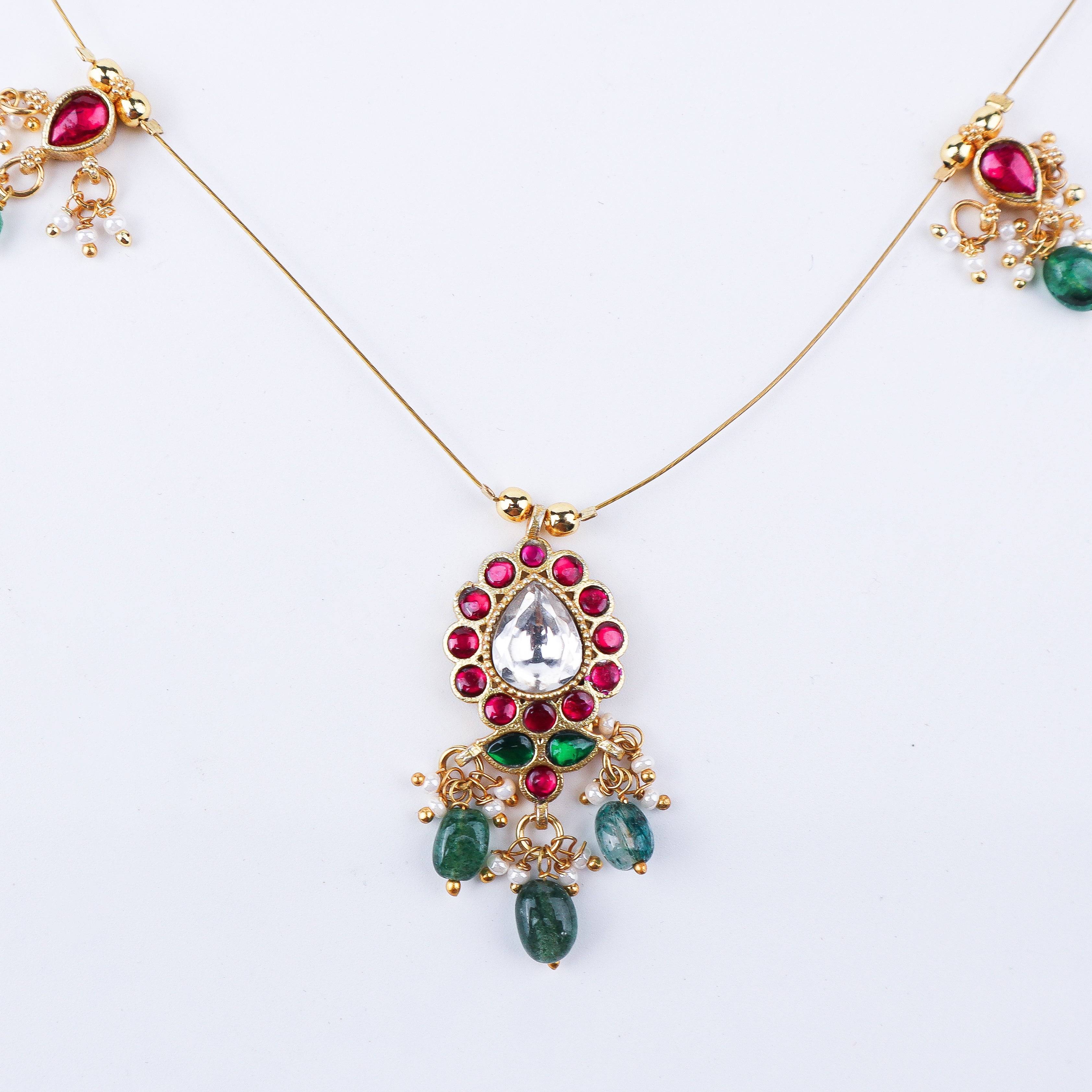 Close-up of a 22K gold-plated fashion necklace showcasing intricate detailing, fine craftsmanship, and rich 22K gold plating