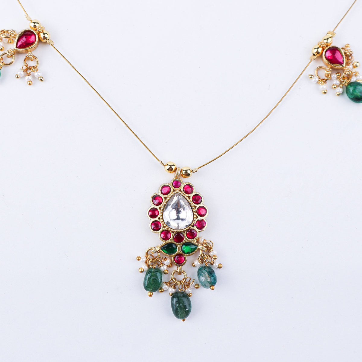 Close-up of a 22K gold-plated fashion necklace showcasing intricate detailing, fine craftsmanship, and rich 22K gold plating