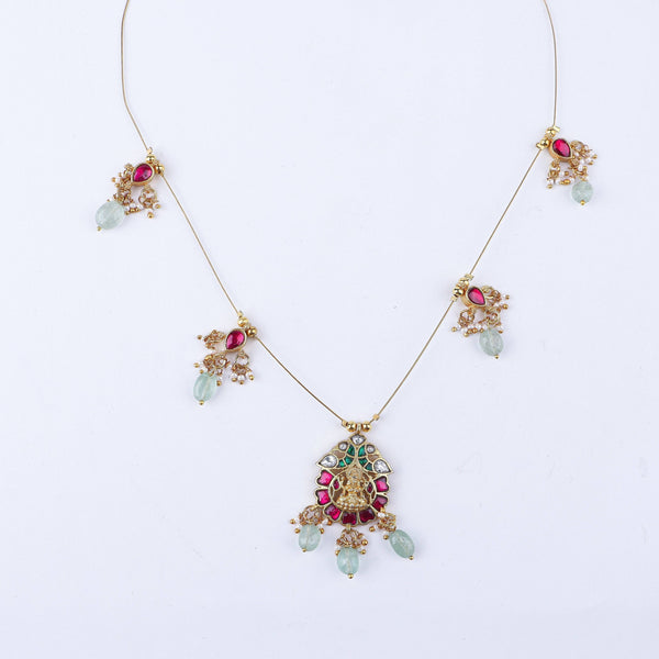 Close-up of a 22K gold-plated fashion necklace showcasing intricate detailing, fine craftsmanship, and rich 22K gold plating