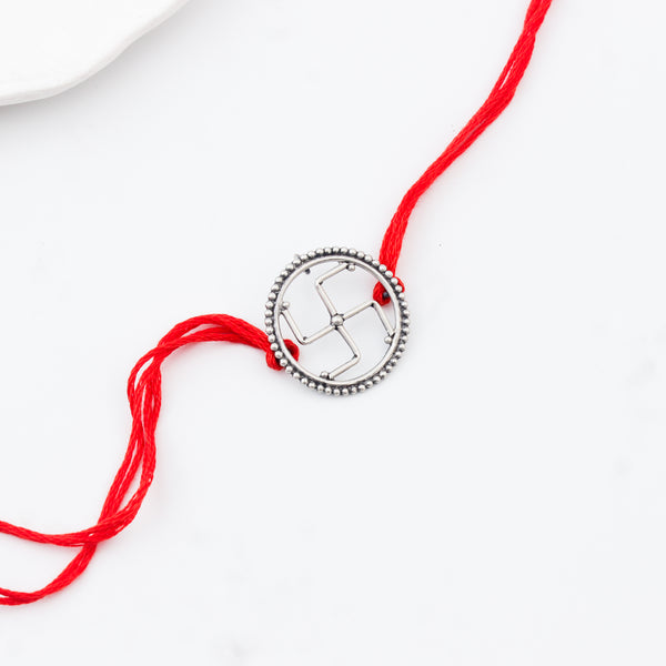 Handcrafted Silver Rakhi/Pendant: Swastik