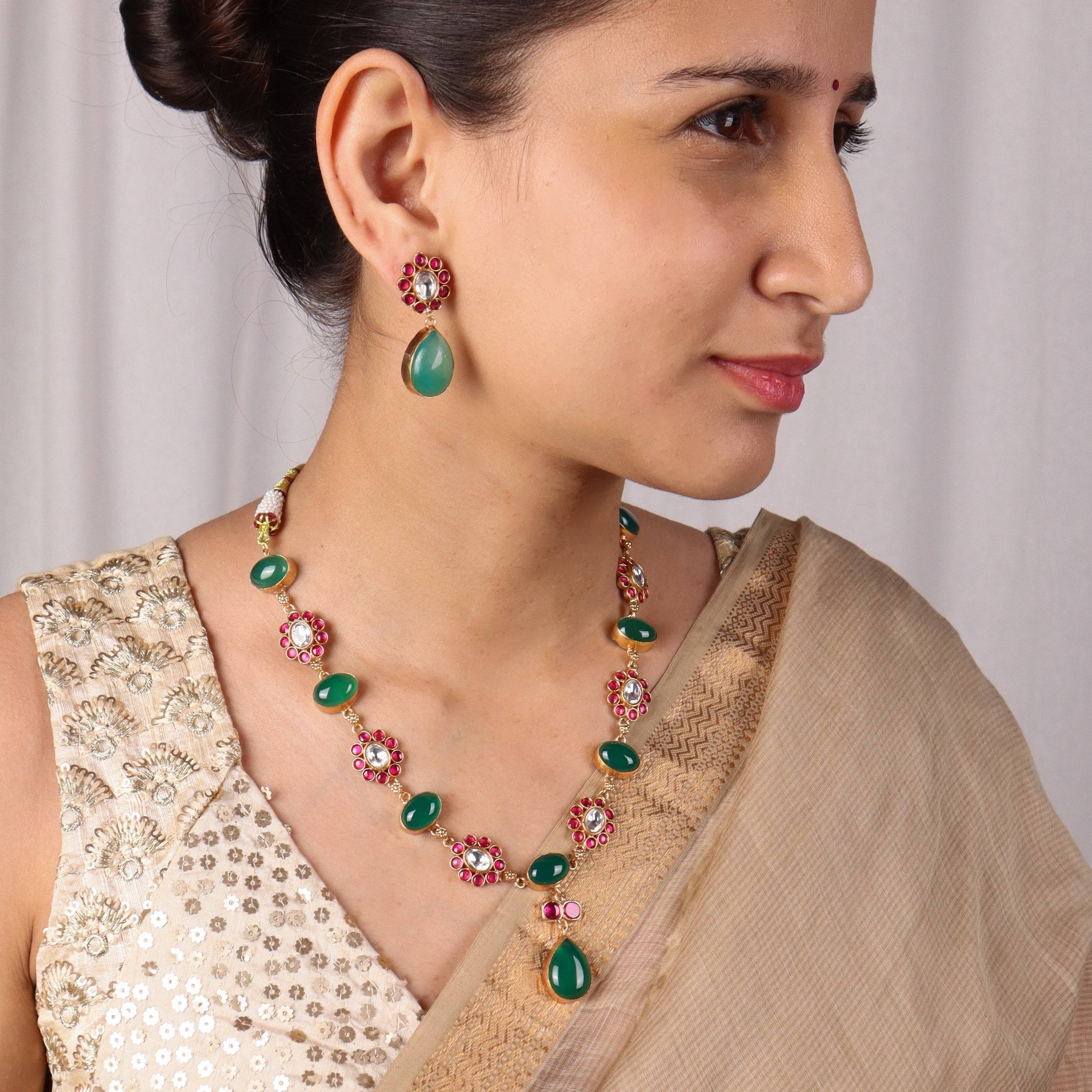 Model wearing 22K gold-plated fashion sets for a sophisticated and elegant jewelry look