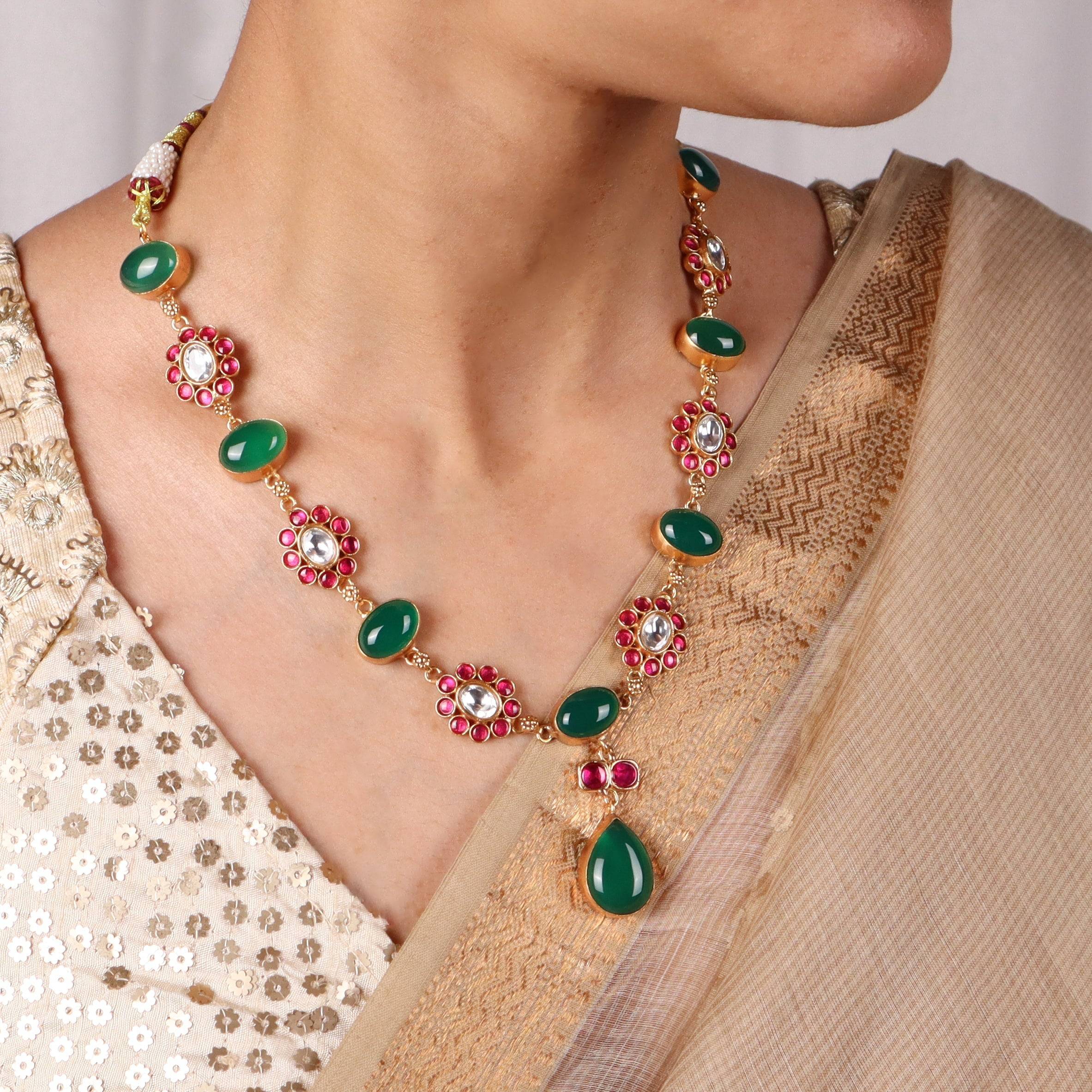 Model wearing 22K gold-plated fashion sets for a sophisticated and elegant jewelry look