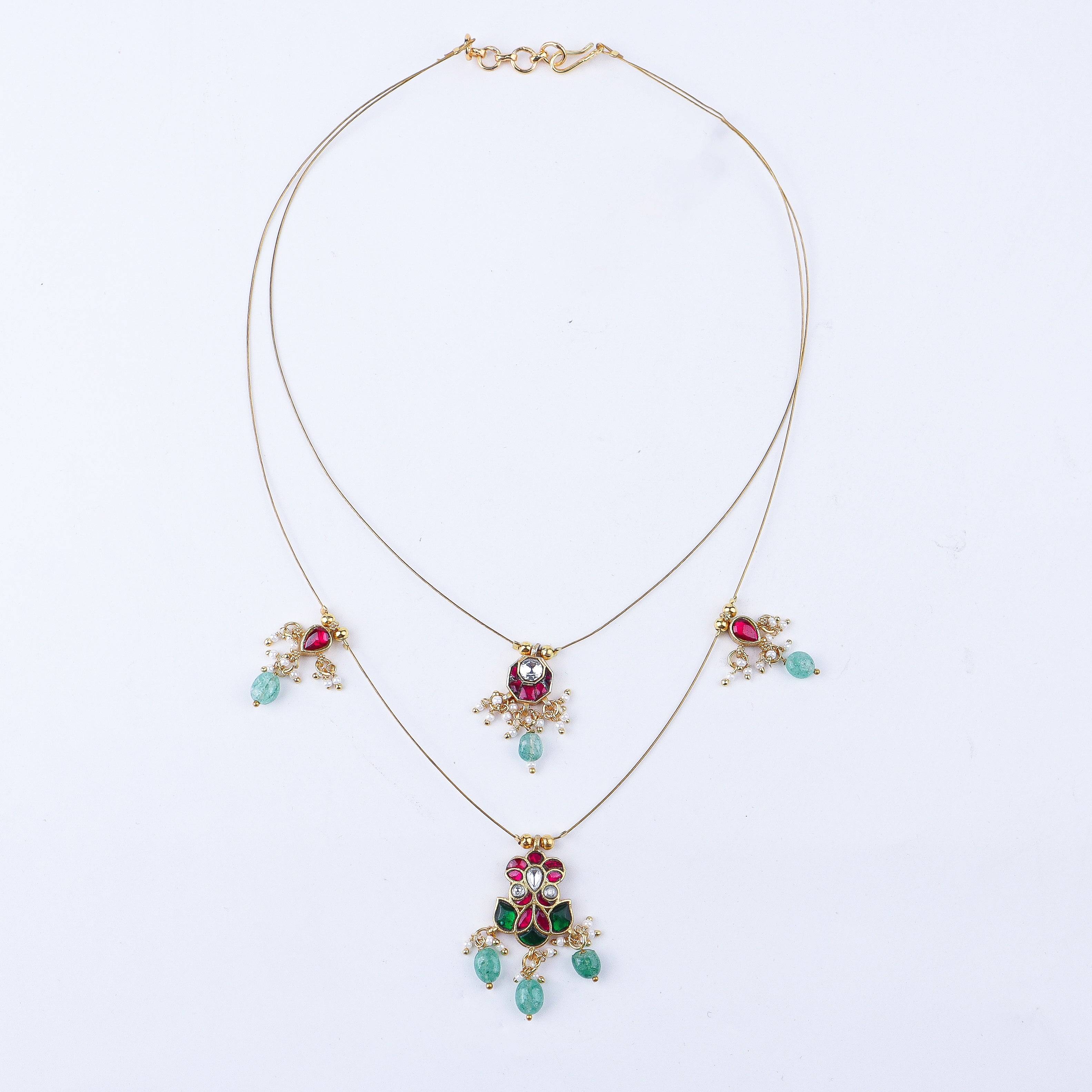 Detailed view of a 22K gold-plated fashion necklace highlighting intricate motifs, textured detailing, and premium 22K gold-plated finish