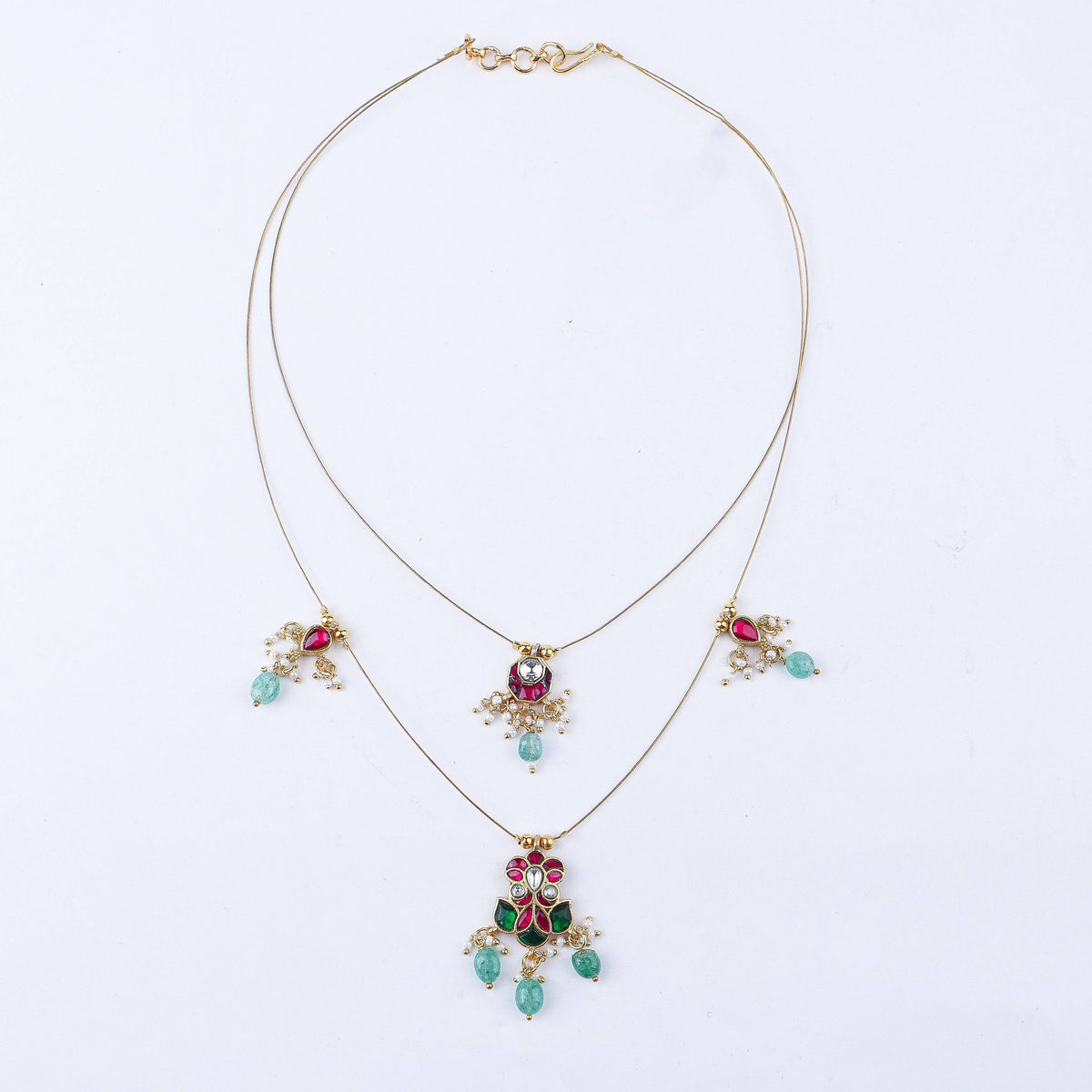 Detailed view of a 22K gold-plated fashion necklace highlighting intricate motifs, textured detailing, and premium 22K gold-plated finish