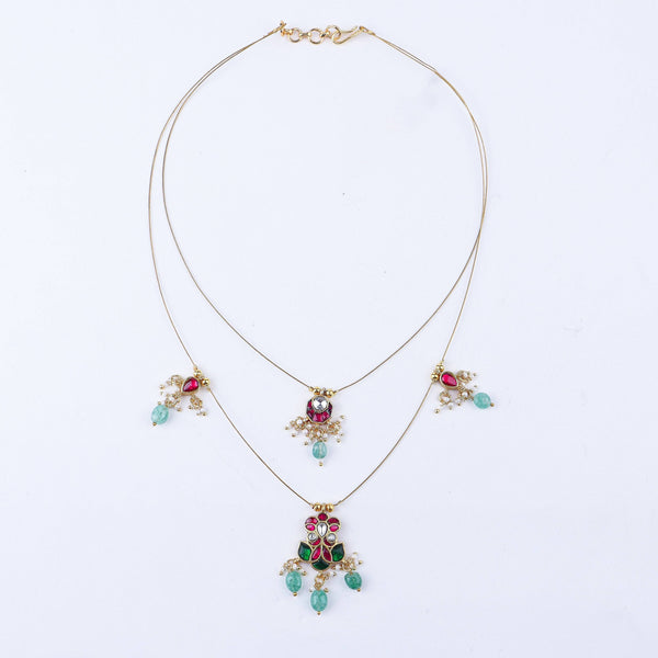 Detailed view of a 22K gold-plated fashion necklace highlighting intricate motifs, textured detailing, and premium 22K gold-plated finish