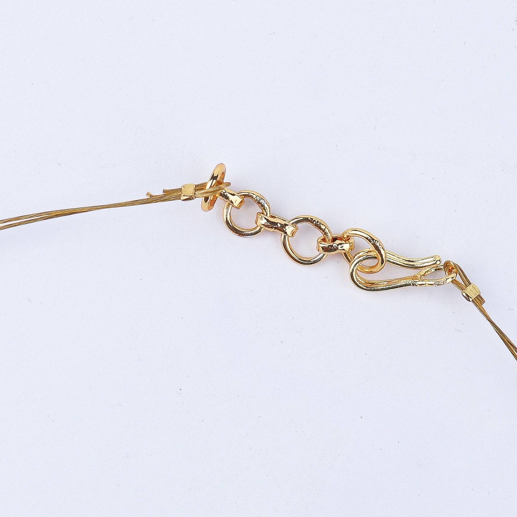 Angled view of a 22K gold-plated fashion necklace highlighting its elegant structure, unique design, and polished gold finish
