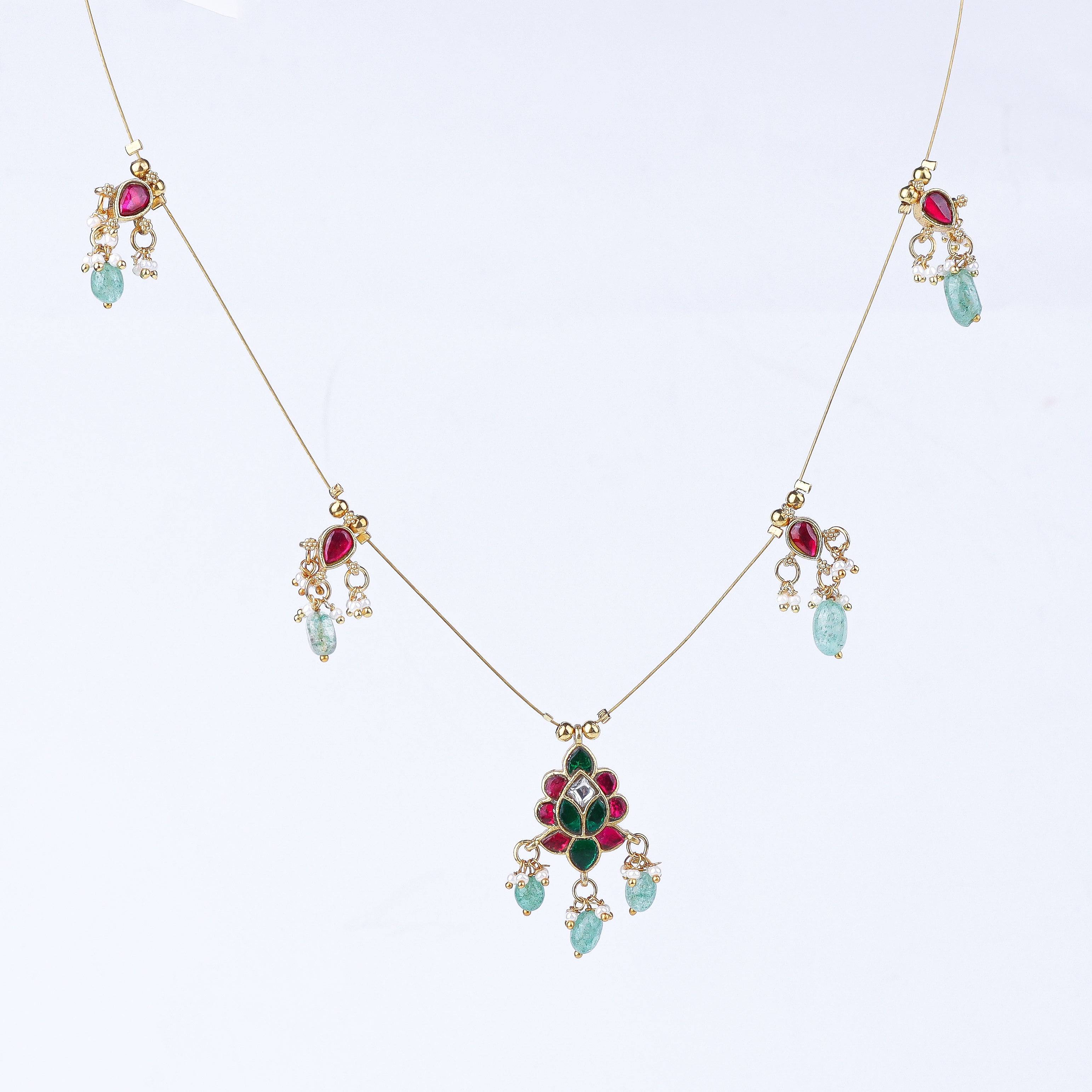 Detailed view of a 22K gold-plated fashion necklace highlighting intricate motifs, textured detailing, and a premium 22K gold-plated finish