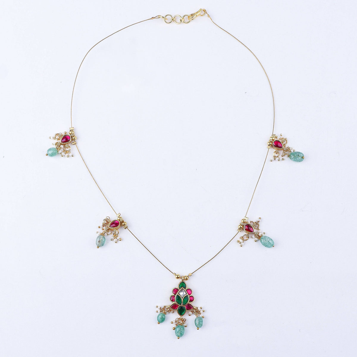 Detailed view of a 22K gold-plated fashion necklace highlighting intricate motifs, textured detailing, and premium 22K gold-plated finish