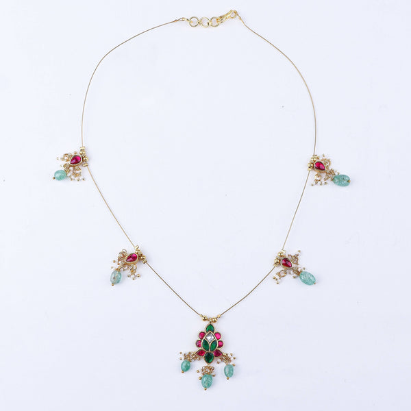 Detailed view of a 22K gold-plated fashion necklace highlighting intricate motifs, textured detailing, and premium 22K gold-plated finish