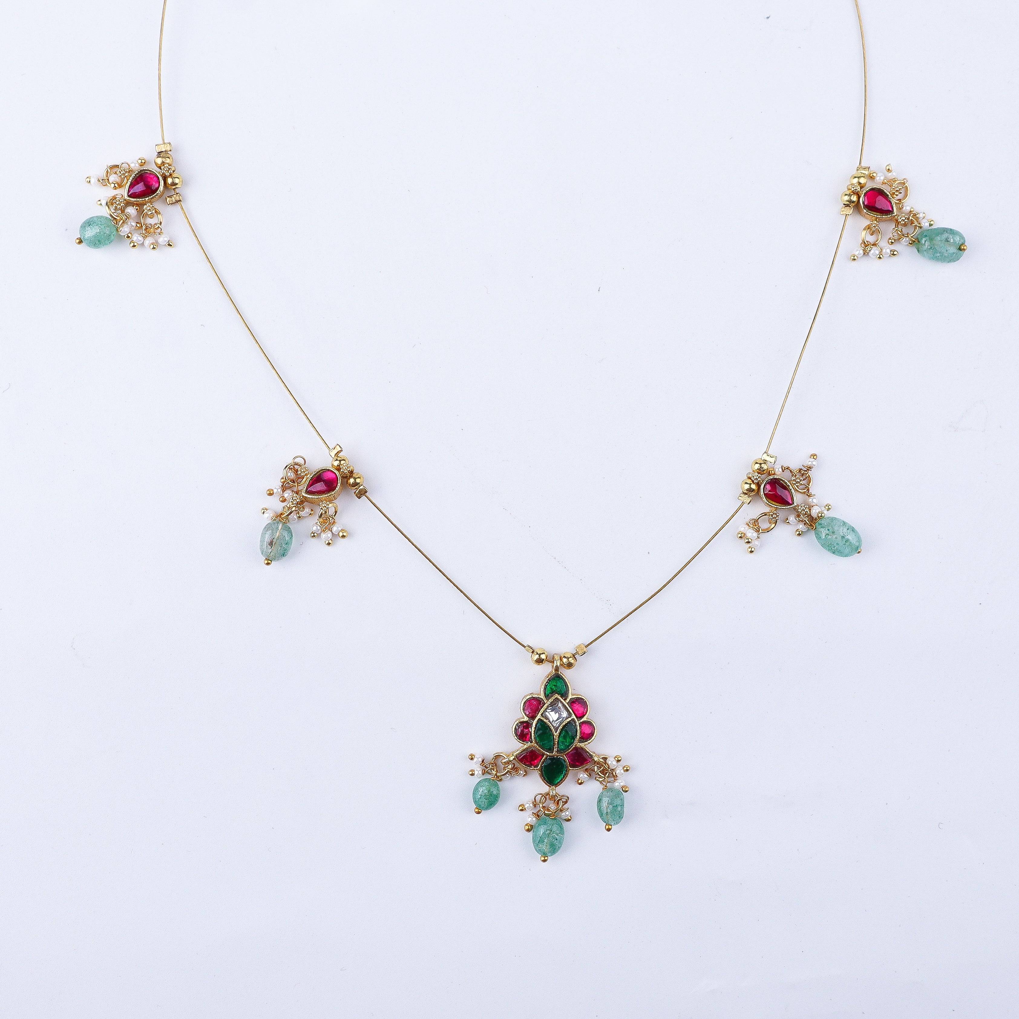 Close-up of 22K gold-plated fashion necklace showcasing intricate detailing, fine craftsmanship, and rich 22K gold plating