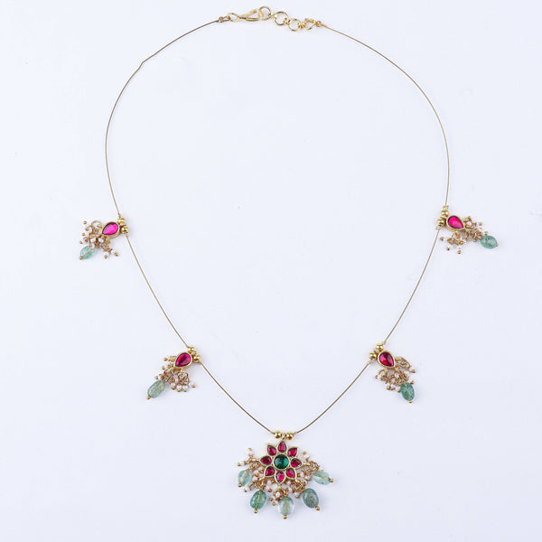 Detailed view of a 22K gold-plated fashion necklace highlighting intricate motifs, textured detailing, and a premium 22K gold-plated finish