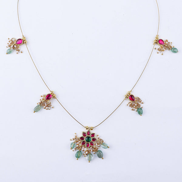 Close-up of a 22K gold-plated fashion necklace showcasing intricate detailing, fine craftsmanship, and rich 22K gold plating