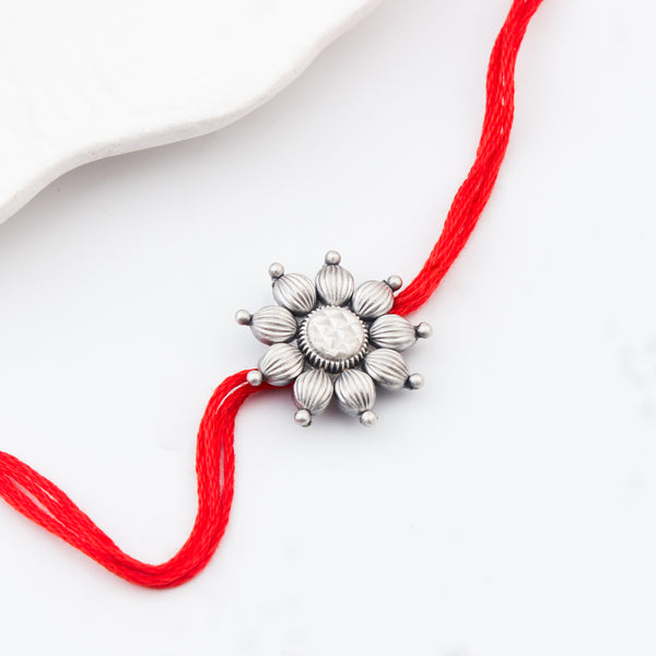 Handcrafted Silver Rakhi/Pendant: Big Flower