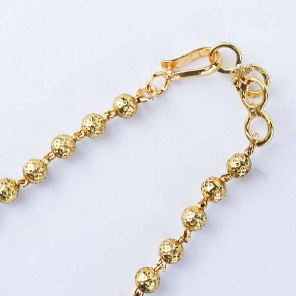 Angled view of the 22K gold-plated fashion set highlighting its coordinated design, elegant structure, and polished gold finish